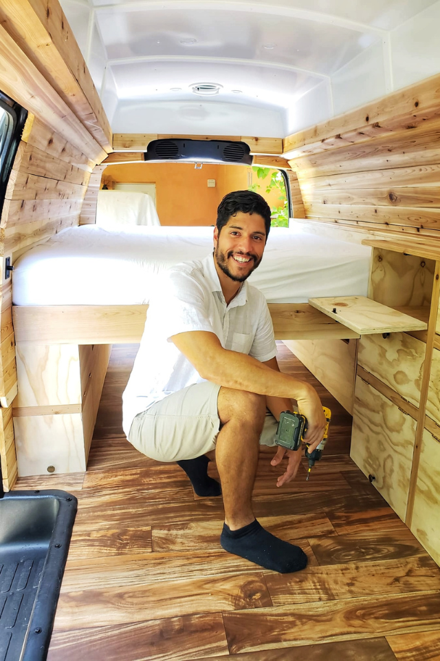 Camper Van Builder performing custom Woodworker on a vehicle